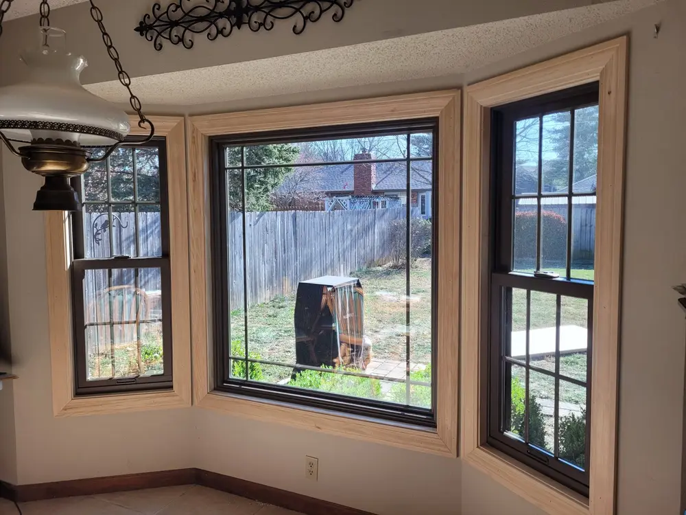 Bay window with new trim above a kitchen counter