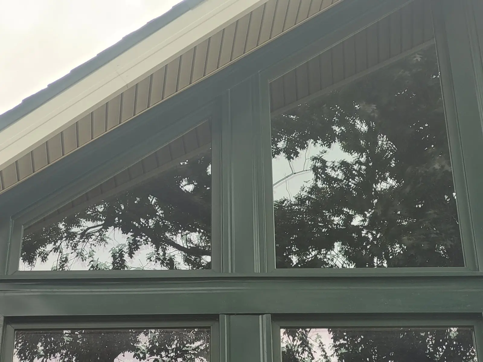 Wrapped soffit and window trim seen from below